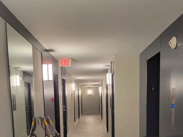 Commercial hallway painting in progress by AG Renovation.