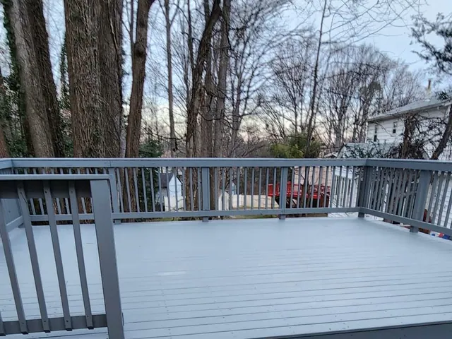 Freshly painted gray deck and railings.