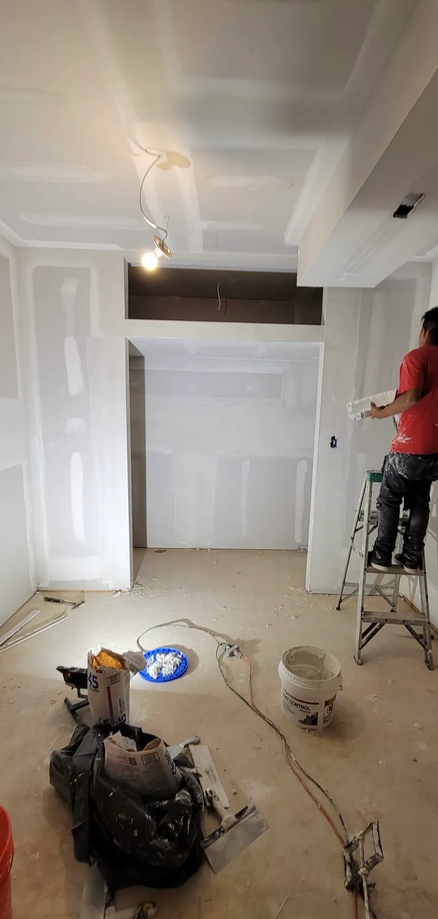 Drywall mudding and taping completed during an interior renovation.